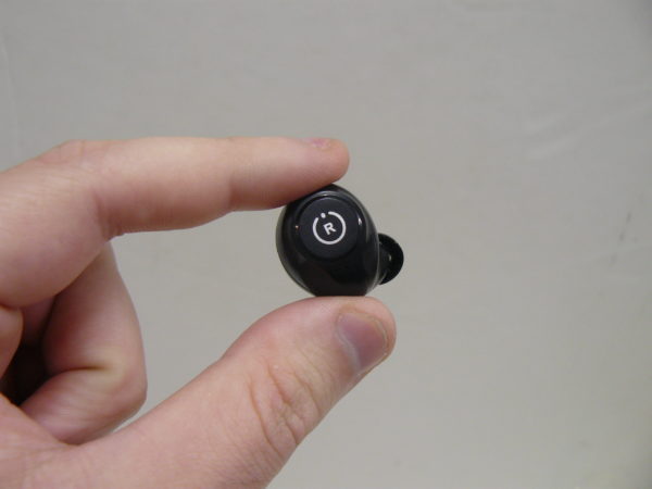 earbud in hand